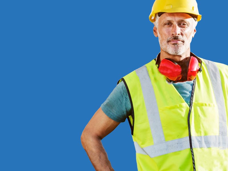 Man in safety vest looking forward